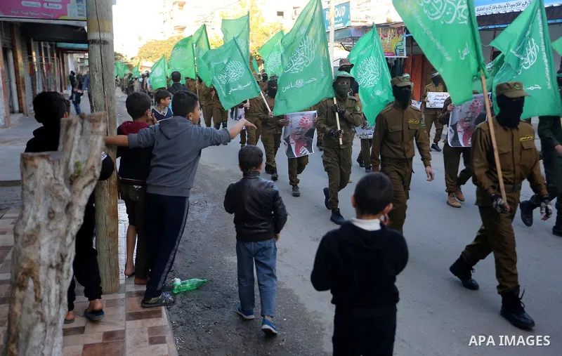 Palestinian demonstrators during a demonstration in the town of Nusseirat in the Middle Gaza Strip on 8 December 2017 against the decision of US President Donald Trump to recognize Jerusalem as the capital of Israel. Pho...