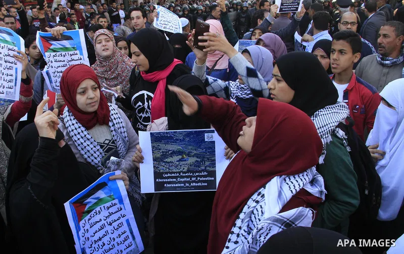 Egyptian Protestors shout slogans during a demonstration against US President Donald Trump's decision to recognize Jerusalem as the capital of Israel at al-Azhar mosque in Cairo on December 8, 2017. Tens of thousands of...