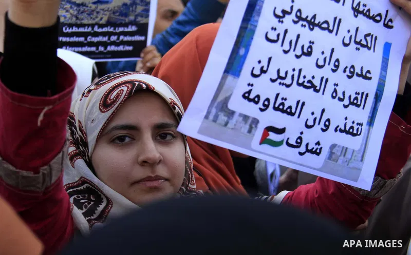 Egyptian Protestors shout slogans during a demonstration against US President Donald Trump's decision to recognize Jerusalem as the capital of Israel at al-Azhar mosque in Cairo on December 8, 2017. Tens of thousands of...