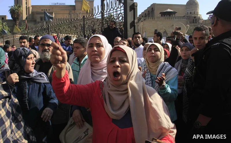 Egyptian Protestors shout slogans during a demonstration against US President Donald Trump's decision to recognize Jerusalem as the capital of Israel at al-Azhar mosque in Cairo on December 8, 2017. Tens of thousands of...