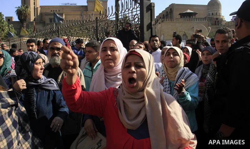 Egyptian Protestors shout slogans during a demonstration against US President Donald Trump's decision to recognize Jerusalem as the capital of Israel at al-Azhar mosque in Cairo on December 8, 2017. Tens of thousands of...
