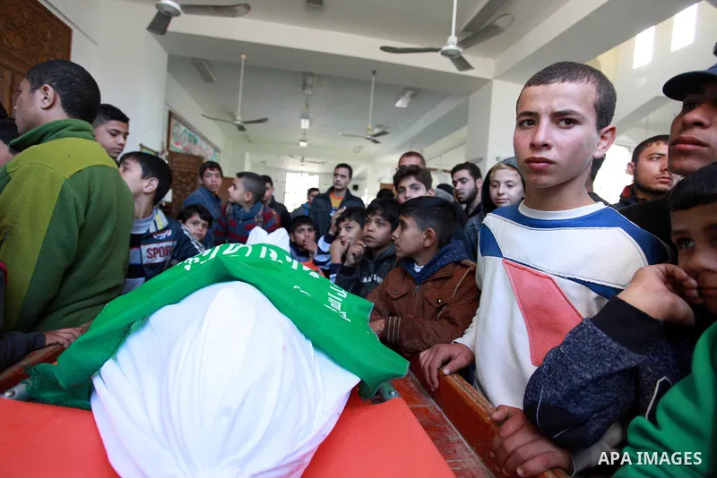 Relatives mourn over the body of Maher Atallah a 54-year-old Palestinian man who was killed the previous day in clashes with Israeli troops, during his funeral at the mosque, in Beit Lahia, in the northern Gaza Strip, on...
