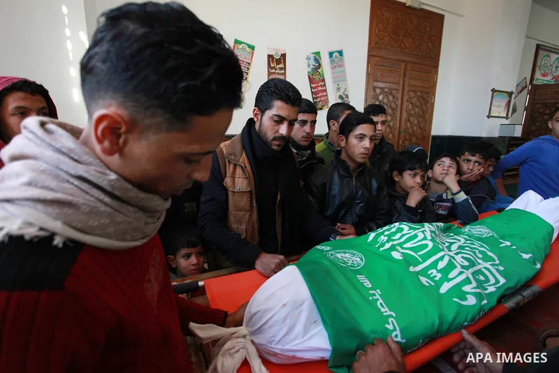 Relatives mourn over the body of Maher Atallah a 54-year-old Palestinian man who was killed the previous day in clashes with Israeli troops, during his funeral at the mosque, in Beit Lahia, in the northern Gaza Strip, on...