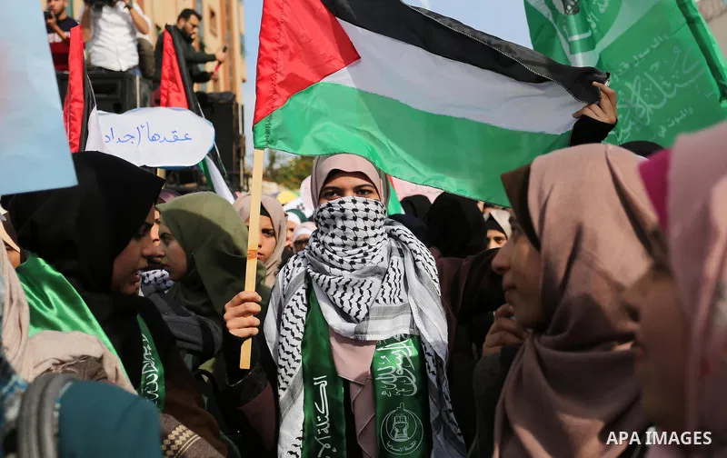 Palestinian students take part in a protest against US President Donald Trump's decision to recognise Jerusalem as the capital of Israel, in Gaza city on December 10, 2017. Photo by Ashraf Amra