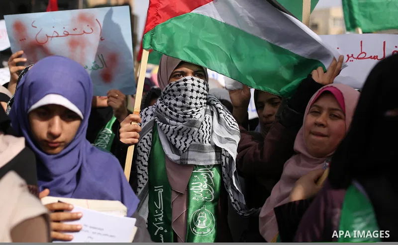 Palestinian students take part in a protest against US President Donald Trump's decision to recognise Jerusalem as the capital of Israel, in Gaza city on December 10, 2017. Photo by Ashraf Amra