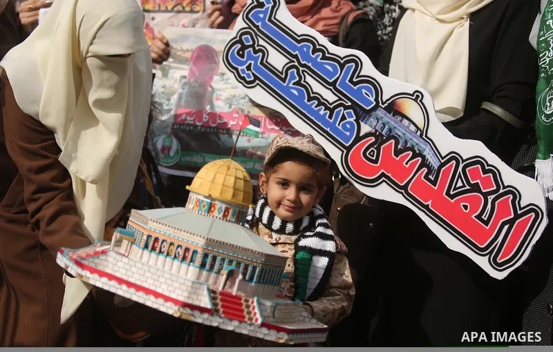 Palestinian students take part in a protest against US President Donald Trump's decision to recognise Jerusalem as the capital of Israel, in Gaza city on December 10, 2017. Photo by Ashraf Amra