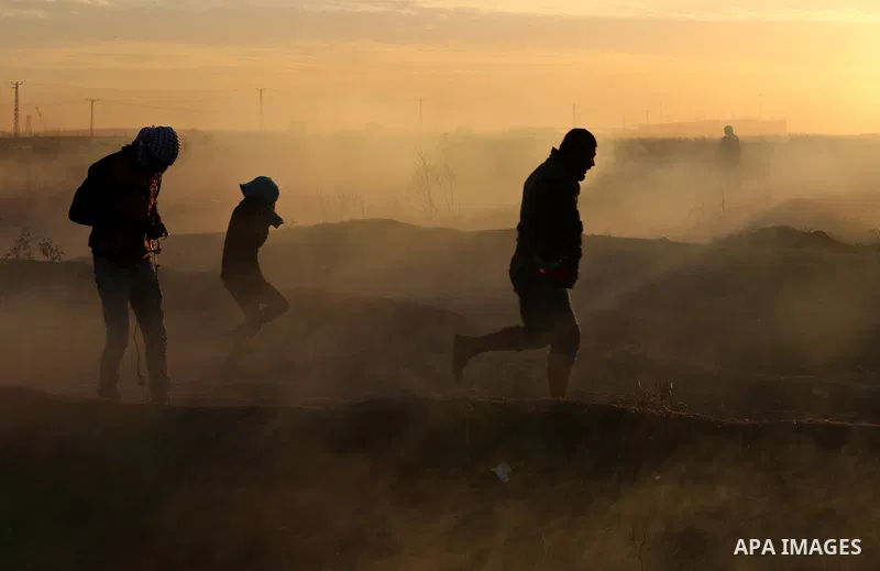 Palestinian protesters clash with Israeli secrity forces near the border fence with Israel, east of Gaza City on December 11, 2017 as demonstrations continue to flare in the Middle East and elsewhere over US President Do...