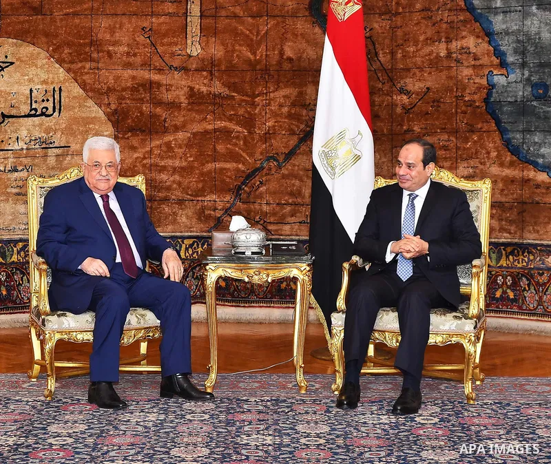 Egyptian President Abdel-Fattah al-Sisi (R) meets with Palestinian President Mahmoud Abbas in Cairo, Egypt, on Dec. 11, 2017. Egyptian President Abdel-Fattah al-Sisi stressed on Monday his country's firm stance on the ne...