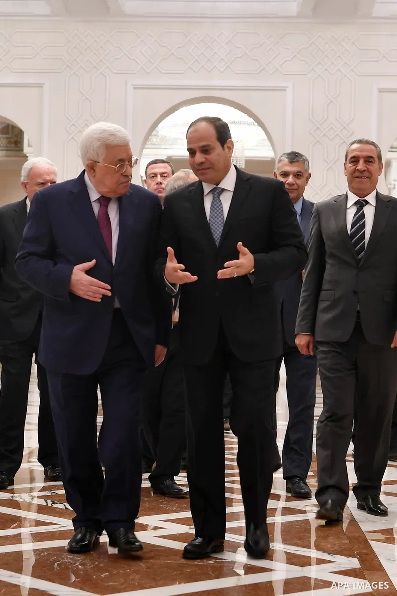 Egyptian President Abdel-Fattah al-Sisi (R) meets with Palestinian President Mahmoud Abbas in Cairo, Egypt, on Dec. 11, 2017. Egyptian President Abdel-Fattah al-Sisi stressed on Monday his country's firm stance on the ne...