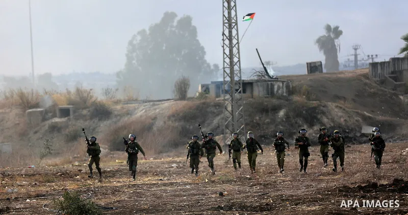 Israeli security forces fire a tear gas canisters during clashes with Israeli security forces in the West Bank town of Tulkarem, following a demonstration against US President Donald Trump's decision to recognise Jerusal...