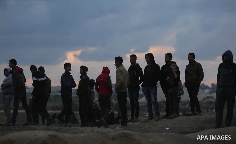 Palestinian protesters clash with Israeli secrity forces near the border fence with Israel, east of Gaza City on December 13, 2017 as demonstrations continue to flare in the Middle East and elsewhere over US President Do...