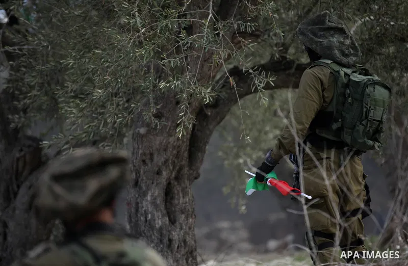 Palestinian protestors, from the nearby Palestinian village of Naqura, confront Israeli security forces close to the Jewish settlement of Shavei Shomron near the West Bank city of Tulkarem on December 14, 2017, as protes...