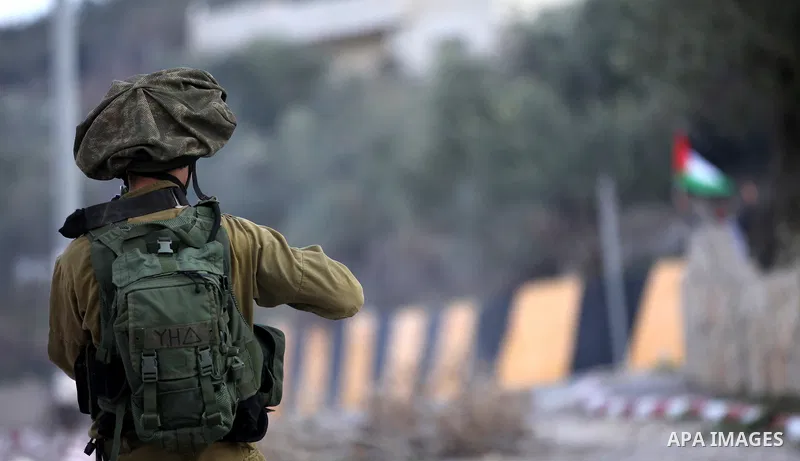 Palestinian protestors, from the nearby Palestinian village of Naqura, confront Israeli security forces close to the Jewish settlement of Shavei Shomron near the West Bank city of Tulkarem on December 14, 2017, as protes...
