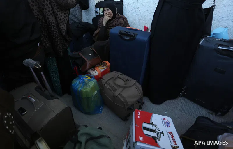 Palestinians wait for travel permits to cross into Egypt through the Rafah border crossing, in Khan Younis in the southern Gaza Strip December 16, 2017. The Palestinian crossing and borders Authority in the Gaza Strip an...