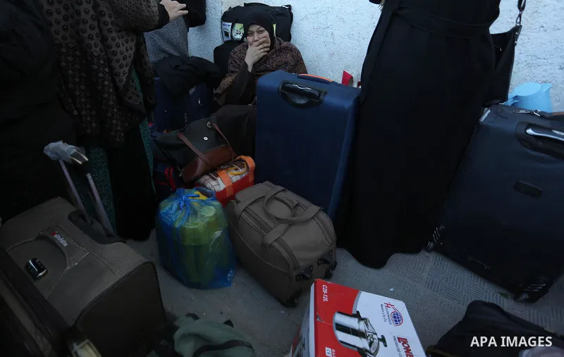 Palestinians wait for travel permits to cross into Egypt through the Rafah border crossing, in Khan Younis in the southern Gaza Strip December 16, 2017. The Palestinian crossing and borders Authority in the Gaza Strip an...