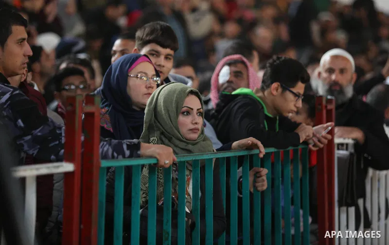 Palestinians wait for travel permits to cross into Egypt through the Rafah border crossing, in Khan Younis in the southern Gaza Strip December 16, 2017. The Palestinian crossing and borders Authority in the Gaza Strip an...