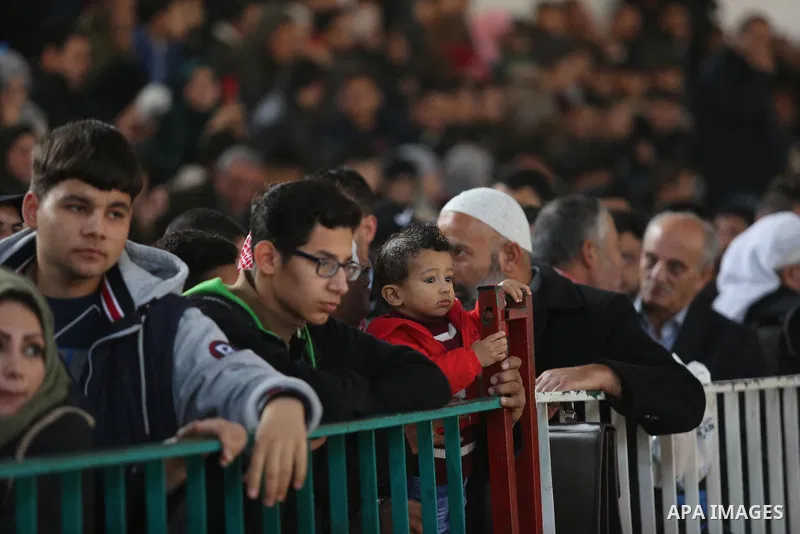 Palestinians wait for travel permits to cross into Egypt through the Rafah border crossing, in Khan Younis in the southern Gaza Strip December 16, 2017. The Palestinian crossing and borders Authority in the Gaza Strip an...