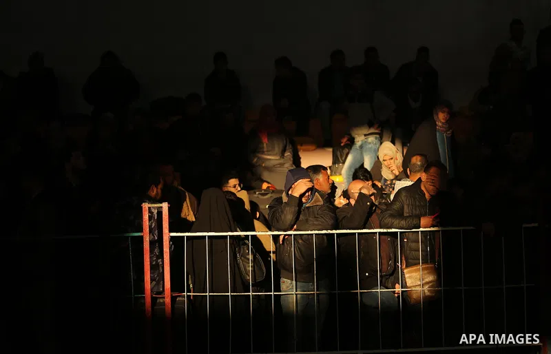 Palestinians wait for travel permits to cross into Egypt through the Rafah border crossing, in Khan Younis in the southern Gaza Strip December 16, 2017. The Palestinian crossing and borders Authority in the Gaza Strip an...