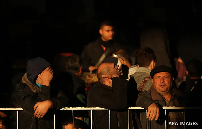 Palestinians wait for travel permits to cross into Egypt through the Rafah border crossing, in Khan Younis in the southern Gaza Strip December 16, 2017. The Palestinian crossing and borders Authority in the Gaza Strip an...