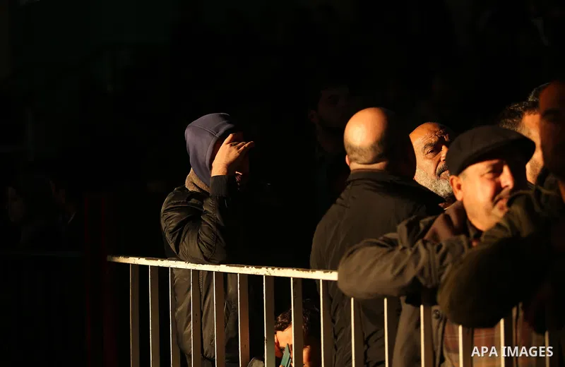 Palestinians wait for travel permits to cross into Egypt through the Rafah border crossing, in Khan Younis in the southern Gaza Strip December 16, 2017. The Palestinian crossing and borders Authority in the Gaza Strip an...