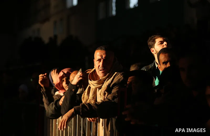 Palestinians wait for travel permits to cross into Egypt through the Rafah border crossing, in Khan Younis in the southern Gaza Strip December 16, 2017. The Palestinian crossing and borders Authority in the Gaza Strip an...