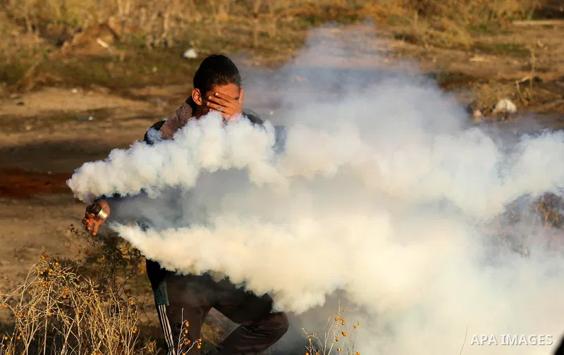 Palestinian protesters clash with Israeli security forces near the border fence with Israel, east of Gaza City on December 16, 2017 as demonstrations continue over US President Donald Trump's declaration of Jerusalem as...