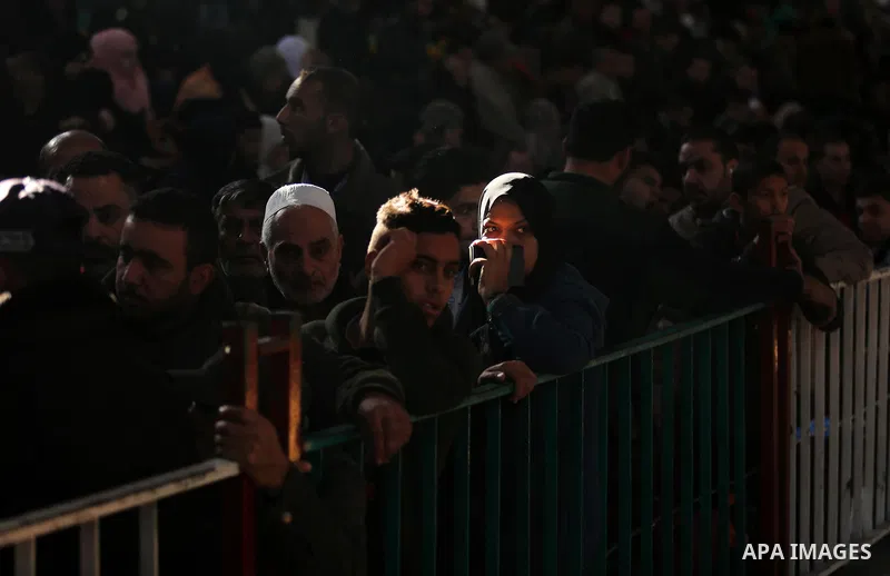 Palestinians wait for travel permits to cross into Egypt through the Rafah border crossing after it was opened by Egyptian authorities for humanitarian cases, in the southern Gaza Strip December 17, 2017. Photo by Ashraf...