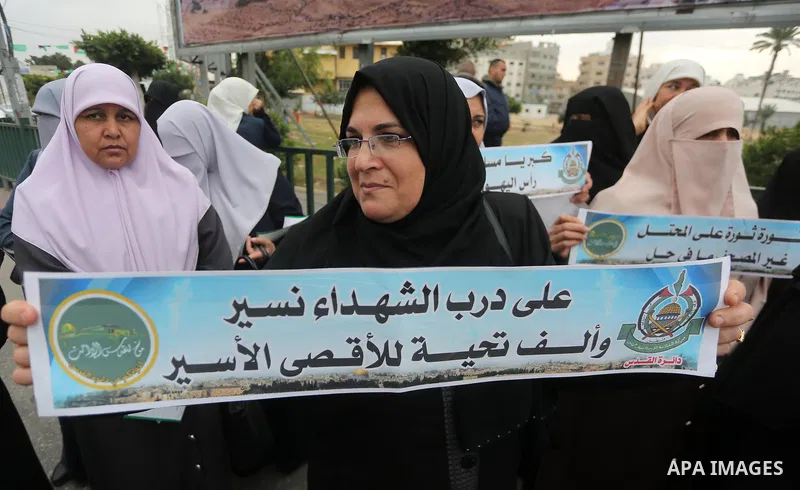 Palestinian supporters of Hamas movement take part in a protest against Trump's decision to recognize Jerusalem as the capital of Israel, in Gaza city, on December 18, 2017. Photo by Mohammed Asad
