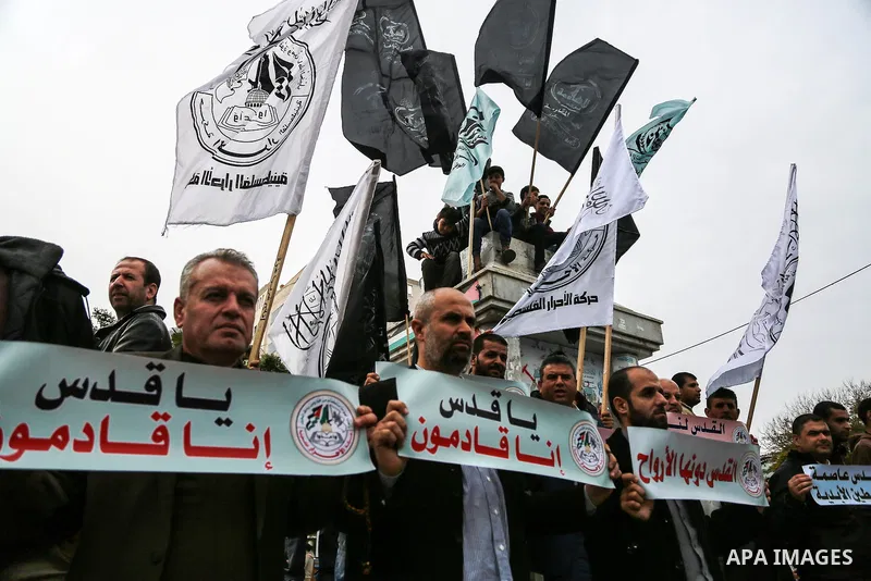 Palestinian demonstrators take part during a protest against U.S. President Donald Trump's decision to recognise Jerusalem as the capital of Israel, in Gaza City December 20, 2017. Photo by Mohammed Dahman