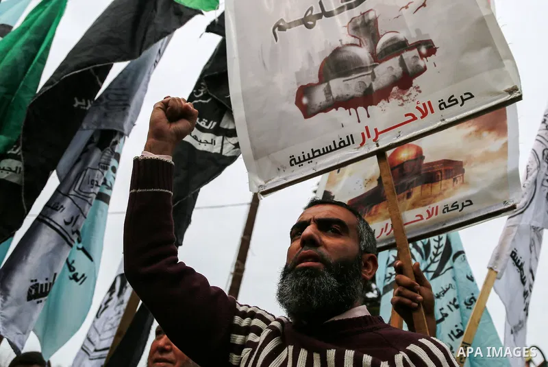 Palestinian demonstrators take part during a protest against U.S. President Donald Trump's decision to recognise Jerusalem as the capital of Israel, in Gaza City December 20, 2017. Photo by Mohammed Dahman
