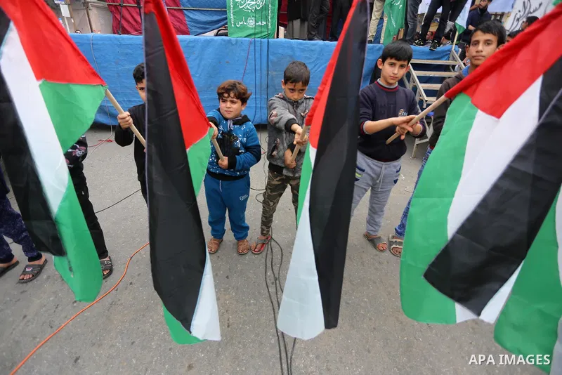 Palestinian supporters Hamas movement take part during a protest against U.S. President Donald Trump's decision to recognise Jerusalem as the capital of Israel, in Jabalia refugee camp in the northern Gaza strip on Decem...