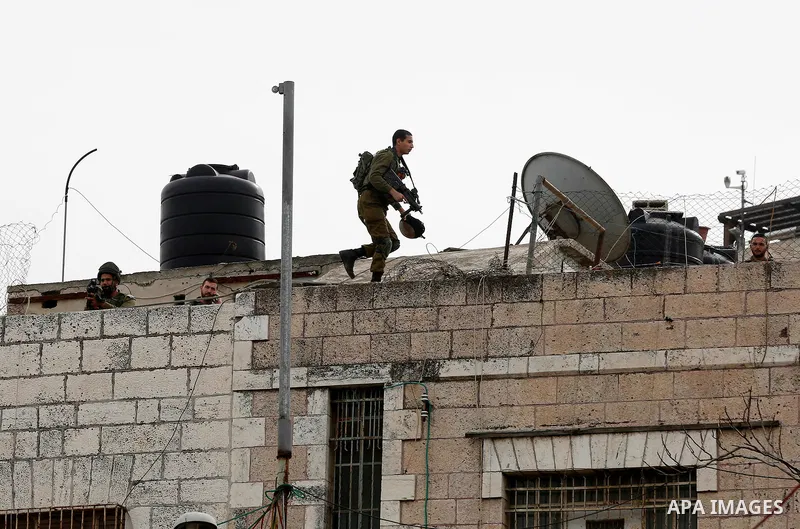 Israeli security froces take position during clashes with Palestinian protesters, at a protest as Palestinians call for a "Day of Rage" in response to U.S. President Donald Trump's recognition of Jerusalem as Israel's ca...