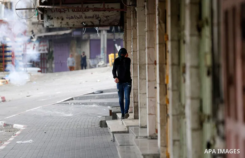 Palestinian protesters clash with Israeli security forces, at a protest as Palestinians call for a "Day of Rage" in response to U.S. President Donald Trump's recognition of Jerusalem as Israel's capital, in the West Bank...