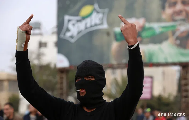 Palestinian protesters clash with Israeli security forces near the Huwara checkpoint south of Nablus in the Israeli-occupied West Bank, as Palestinians call for a "Day of Rage" in response to U.S. President Donald Trump'...