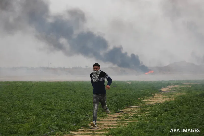 Palestinian protesters clash with Israeli security forces, at a protest as Palestinians call for a "Day of Rage" in response to U.S. President Donald Trump's recognition of Jerusalem as Israel's capital, near the border...