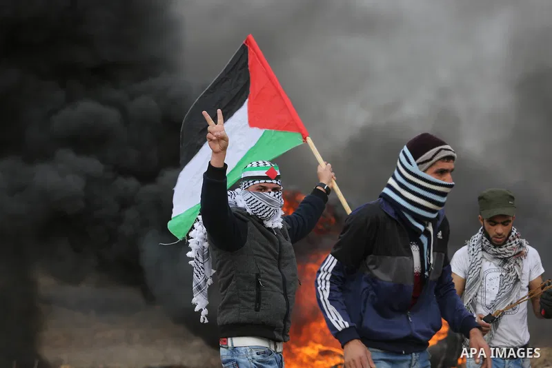 Palestinian protesters clash with Israeli security forces, at a protest as Palestinians call for a "Day of Rage" in response to U.S. President Donald Trump's recognition of Jerusalem as Israel's capital, near the border...
