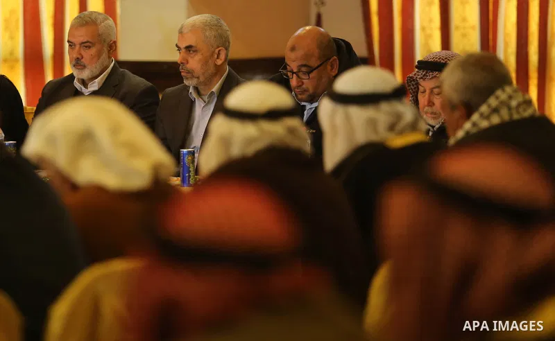 Hamas leader Ismail Haniya and Hamas's leader in the Gaza Strip Yahya Sinwar attend a meeting with heads of Palestinian families in Gaza city on December 26, 2017. Photo by Ashraf Amra