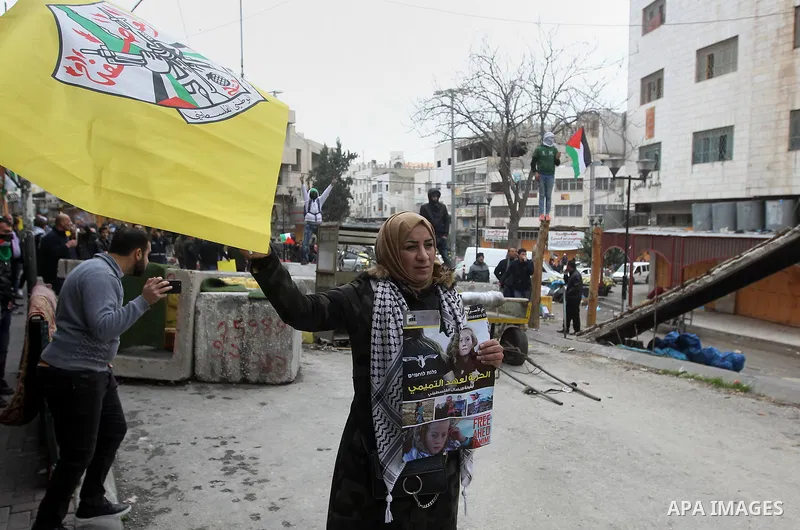 Palestinian demonstrators clash with Israeli security forces in the occupied West Bank city of Hebron on December 29, 2017 as protests continue over US President Donald Trump's declaration of Jerusalem as Israel's capita...