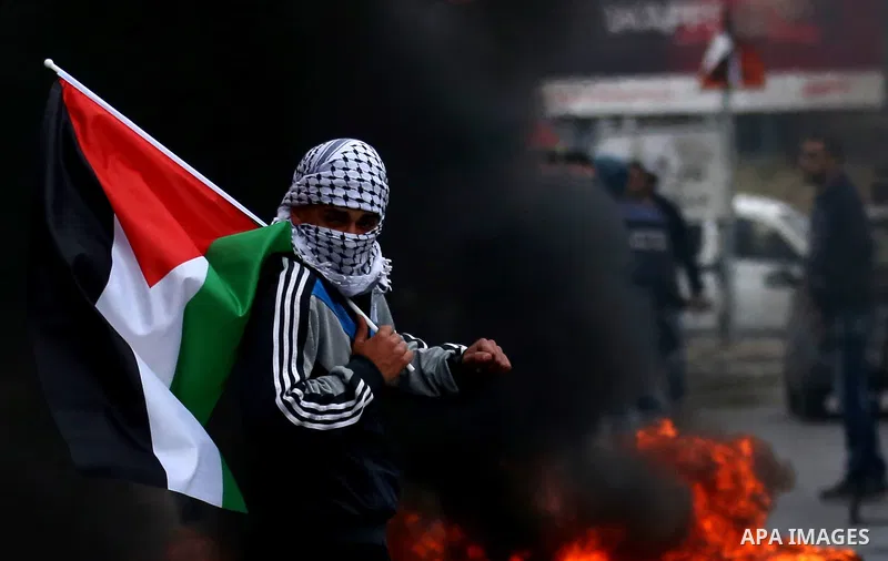 Palestinian protesters clash with Israeli security forces as protests continue over US President Donald Trump's declaration of Jerusalem as Israel's capital at Hawara checkpoint, south of the West Bank city of Nablus on...