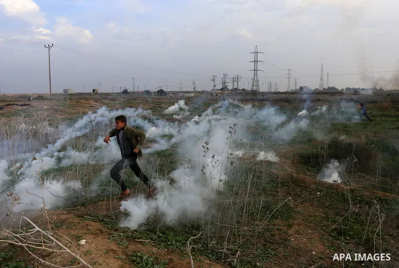 Palestinian protesters clash with Israeli security forces near the Israel-Gaza border east of Gaza City on December 29, 2017, as demonstrations continue over the US president's controversial recognition of Jerusalem as I...