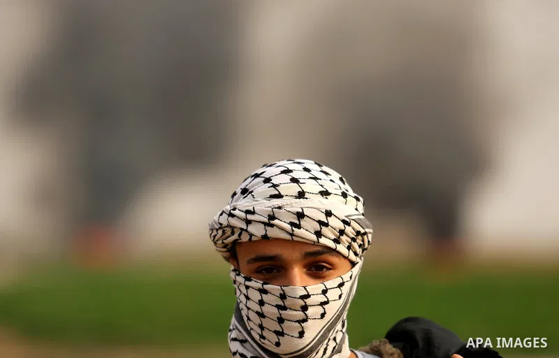 Palestinian protesters clash with Israeli security forces near the border with Israel in the southern Gaza Strip on December 29, 2017, as demonstrations continue over the US president's controversial recognition of Jerus...