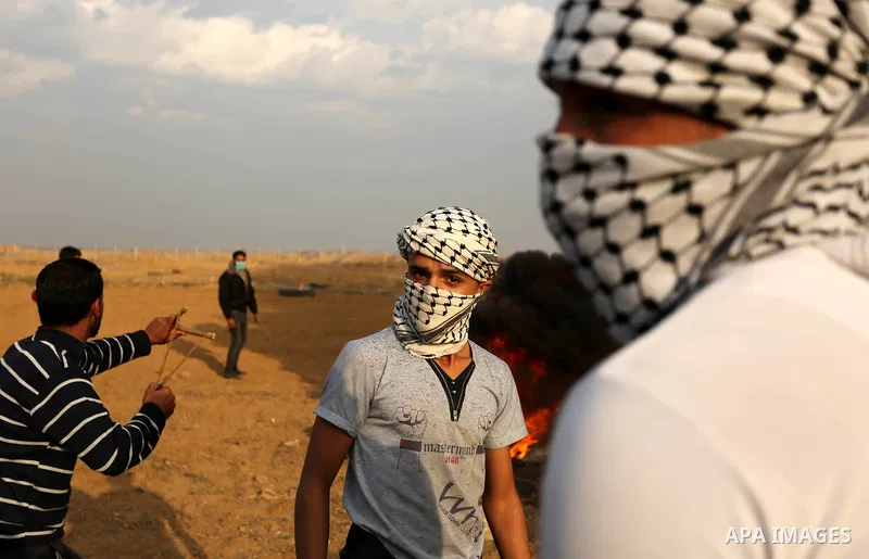 Palestinian protesters clash with Israeli security forces near the border with Israel in the southern Gaza Strip on December 29, 2017, as demonstrations continue over the US president's controversial recognition of Jerus...