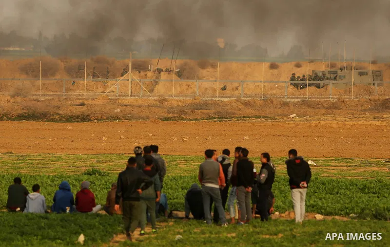 Palestinian protesters clash with Israeli security forces near the border with Israel in the southern Gaza Strip on December 29, 2017, as demonstrations continue over the US president's controversial recognition of Jerus...
