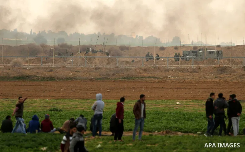 Palestinian protesters clash with Israeli security forces near the border with Israel in the southern Gaza Strip on December 29, 2017, as demonstrations continue over the US president's controversial recognition of Jerus...