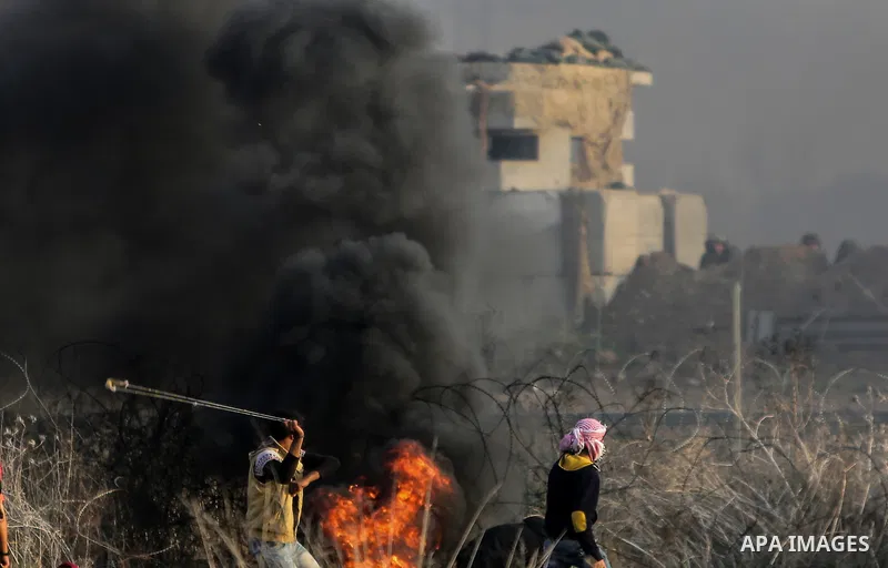 Palestinian protesters clash with Israeli security forces near the Israel-Gaza border east of Gaza City on December 29, 2017, as demonstrations continue over the US president's controversial recognition of Jerusalem as I...