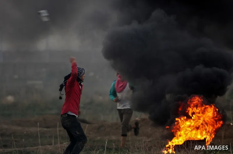Palestinian protesters clash with Israeli security forces near the Israel-Gaza border east of Gaza City on December 29, 2017, as demonstrations continue over the US president's controversial recognition of Jerusalem as I...