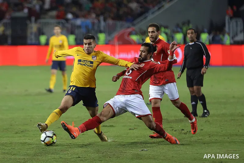Egypt's Al-Ahly and Spain's Atletico Madrid players compete during the friendly football match at Borg al-Arab Stadium, near Alexandria, on December 30, 2017. Photo by Stringer