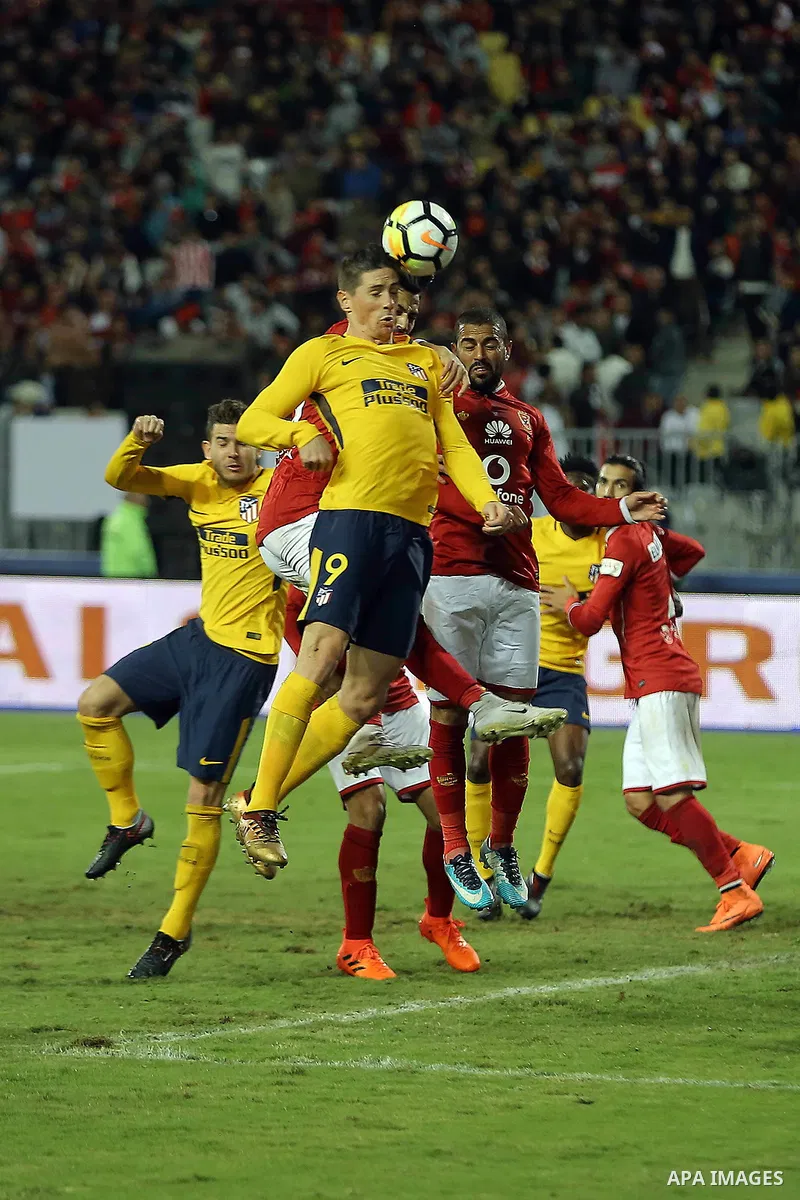 Egypt's Al-Ahly and Spain's Atletico Madrid players compete during the friendly football match at Borg al-Arab Stadium, near Alexandria, on December 30, 2017. Photo by Stringer