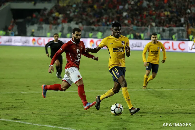 Egypt's Al-Ahly and Spain's Atletico Madrid players compete during the friendly football match at Borg al-Arab Stadium, near Alexandria, on December 30, 2017. Photo by Stringer
