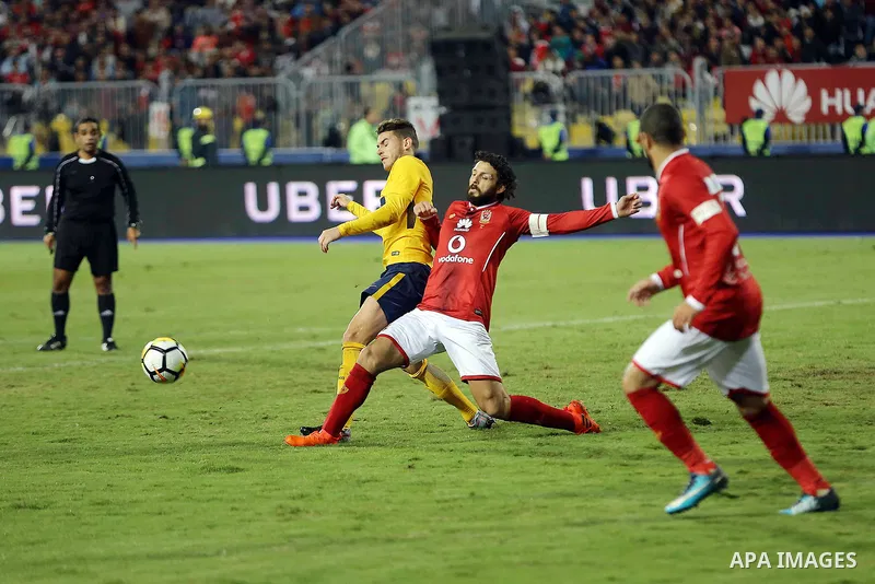 Egypt's Al-Ahly and Spain's Atletico Madrid players compete during the friendly football match at Borg al-Arab Stadium, near Alexandria, on December 30, 2017. Photo by Stringer